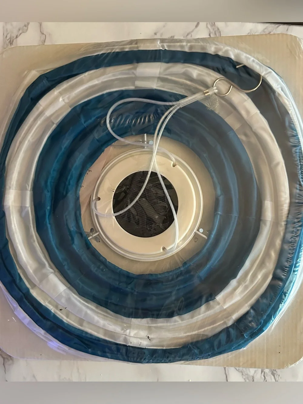 Blue and white IKEA Solvinden Lantern
